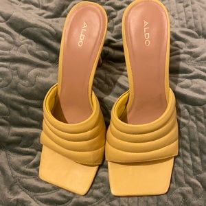 Yellow Aldo square toe heel. Worn once!